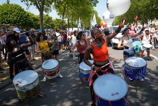 Demonstrators bang drums during a protest in Paris, France 