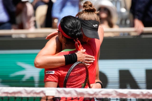 Beatriz Haddad Maia and Ons Jabeur embrace