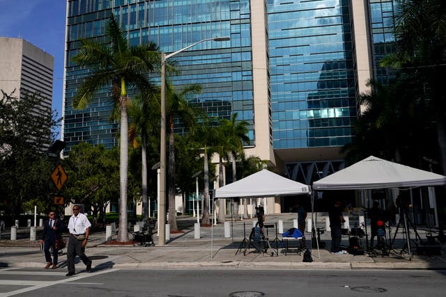News media set up outside the Wilkie D Ferguson Jr US Courthouse, where a grand jury was meeting, on Wednesday, in Miami