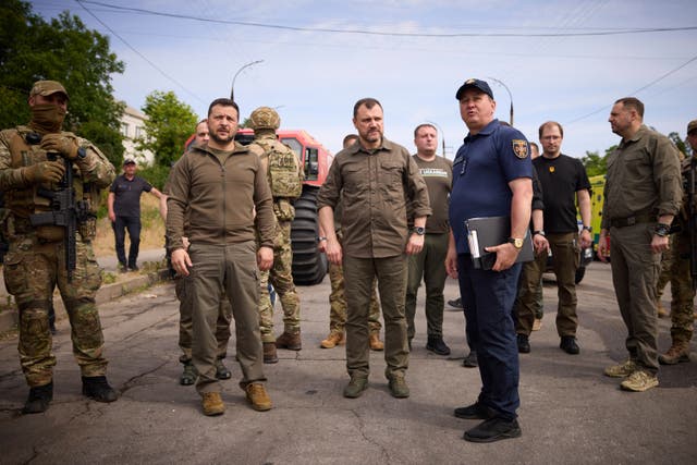 Ukrainian President Volodymyr Zelensky visits the flood-hit areas in Kherson, Ukraine 