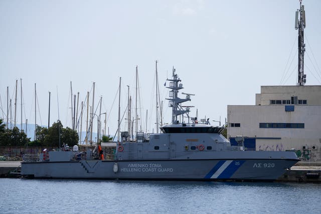 A Greek coastguard vessel docked at the port in Kalamata town 
