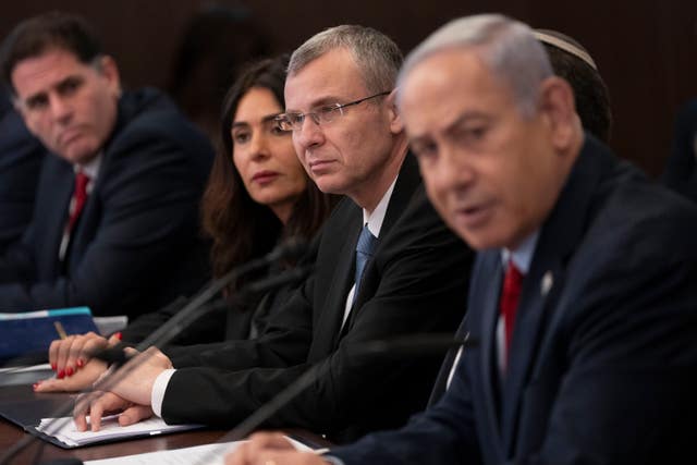 Israeli prime minister Benjamin Netanyahu, right, and minister of justice Yariv Levin at a weekly cabinet meeting 