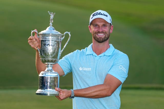 Wyndham Clark celebrates with the US Open trophy