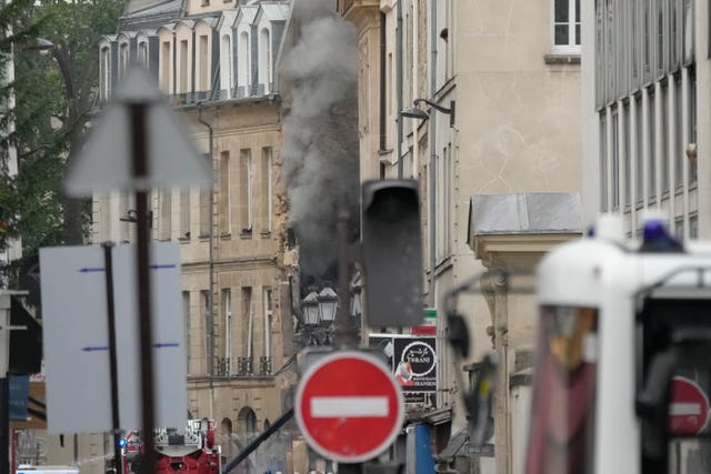 Smoke billows from a building in Paris 