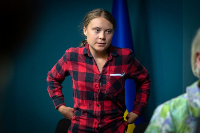 Greta Thunberg stands prior of a press conference of the newly created working group