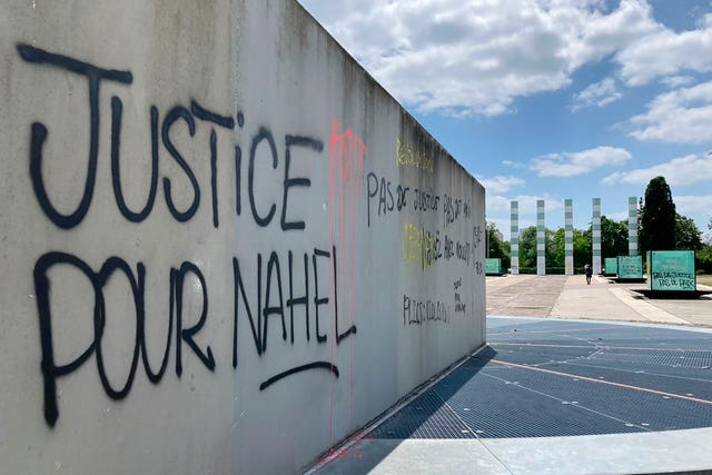 Graffiti stating 'justice for Nahel' on a wall in the Paris suburb of Nanterre 