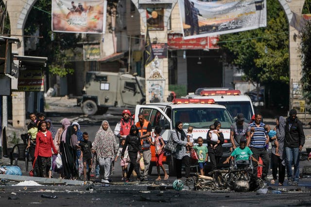 Residents of the Jenin refugee camp flee their homes