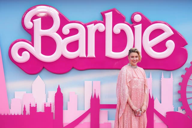 Writer/director/executive producer Greta Gerwig poses for photographers at the premiere of the film Barbie in London 