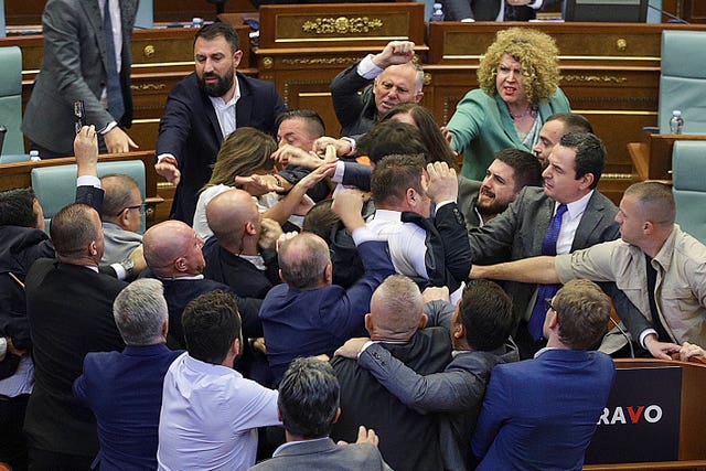 Legislators push each other as a brawl breaks out in Kosovo’s parliament in Pristina 