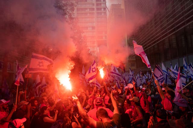 Israelis protest against plans by Prime Minister Benjamin Netanyahu’s government to overhaul the judicial system in Tel Aviv