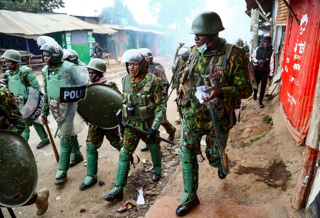 Riot police during clashes with protesters in the Kibera area of Nairobi
