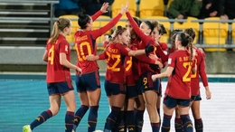 Spain celebrate their third goal (John Cowpland/AP)