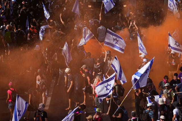 Demonstrators block a road in Jerusalem during a protest against plans by Prime Minister Benjamin Netanyahu’s government to overhaul the judicial system
