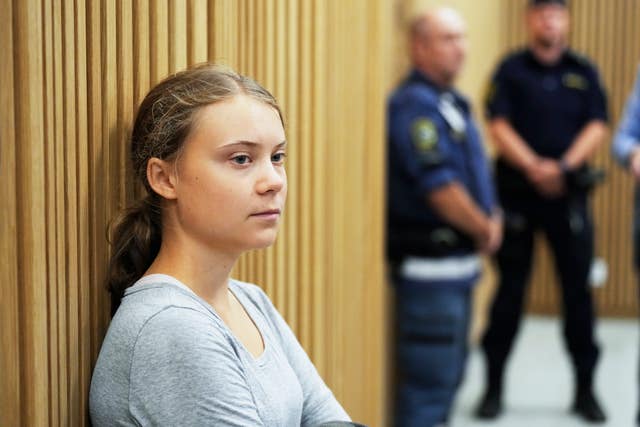 Climate activist Greta Thunberg of Sweden waits for her hearing