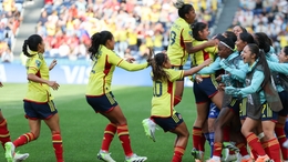 Colombia's Catalina Usme celebrates with team-mates after scoring f