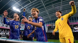Japanese players Miyabi Moriya, Mina Tanaka, Shiori Miyake and Ayaka Yamashita celebrate the win over Costa Rica (Alessandro Tarantino/AP)