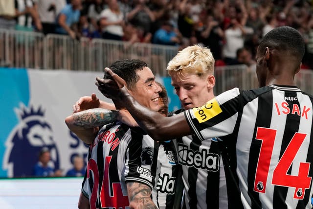 Newcastle's Miguel Almiron (left) celebrates
