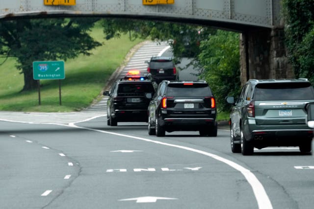 The motorcade carrying Mr Trump as it left Ronald Reagan Washington National Airport