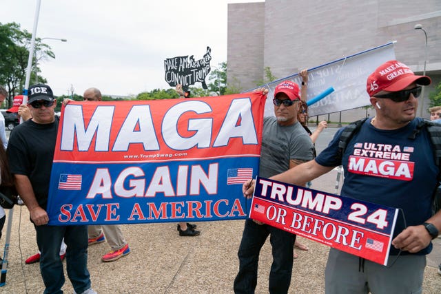 Supporters of Donald Trump rally outside court