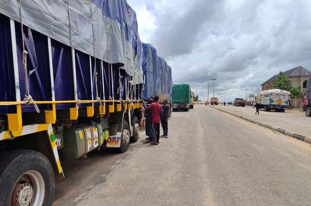 Stranded trucks with goods are seen at the border between Nigeria and Niger in Jibia, Nigeria