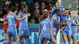 Kenza Dali celebrates with team-mates after scoring France’s second goal (James Elsby/AP)
