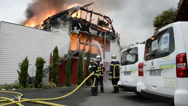 Firefighters try to contain the blaze at a holiday home in the town of Wintzenheim
