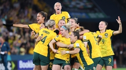Australia celebrate their penalty success (Tertius Pickard/AP)