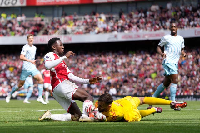 Matt Turner challenges Arsenal’s Eddie Nketiah 