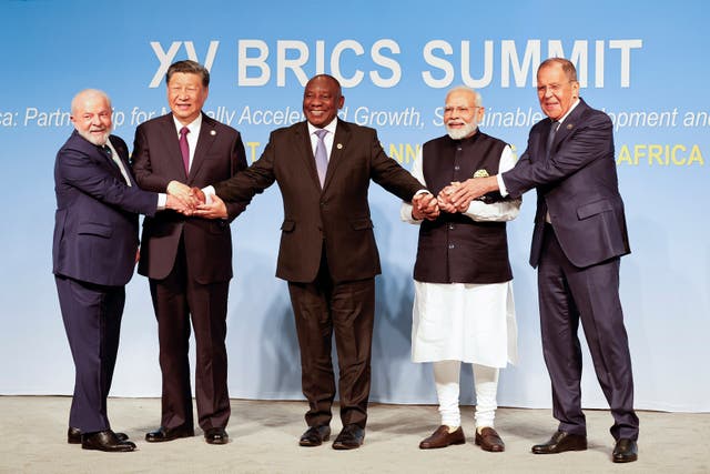 From left, Brazil President Luiz Inacio Lula da Silva, China President Xi Jinping, South African President Cyril Ramaphosa, Prime Minister of India Narendra Modi and Russia’s foreign minister Sergei Lavrov pose for a Brics family photo during the 2023 Brics Summit at the Sandton Convention Centre in Johannesburg, South Africa