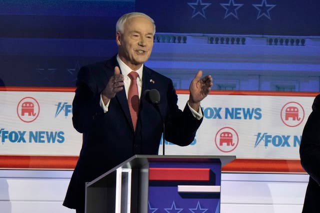 Former Arkansas governor Asa Hutchinson speaks during a Republican presidential primary debate  in Milwaukee