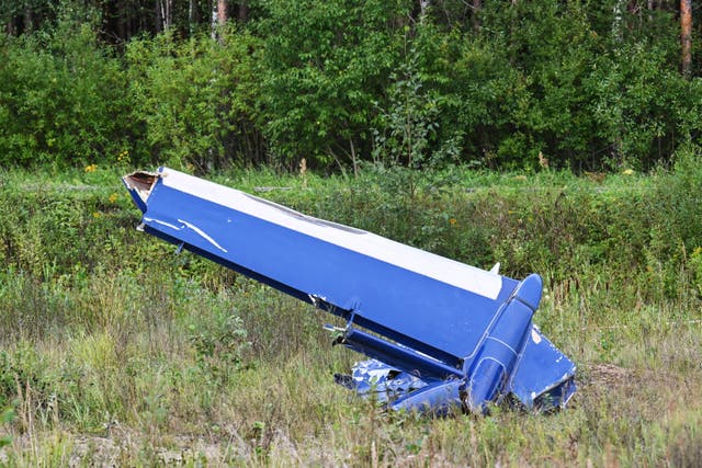 A part of a private jet by the crash site, near the village of Kuzhenkino, in the Tver region of Russia