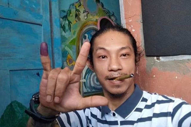 Burmese hip-hop artist Byu Har takes a selfie photo in Yangon, Myanmar, in 2020