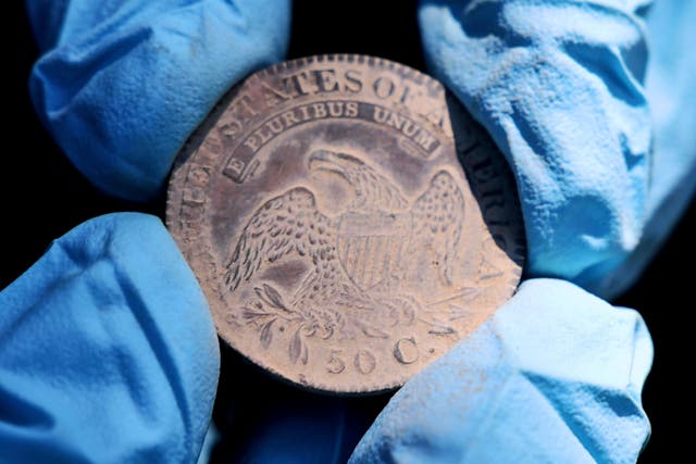 An 1828 Capped Bust Half Dollar, one of the coins found in the lead box believed to have been placed in the base of a monument by cadets almost two centuries ago, in West Point, NY