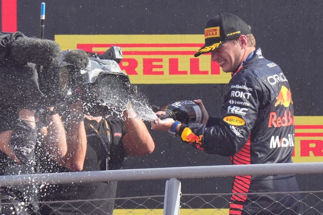 Max Verstappen sprays champagne on cameras