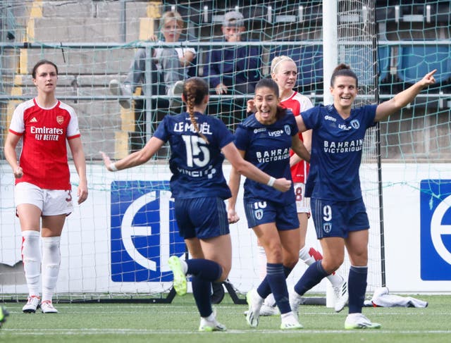 Mathilde Bourdieu, right, of Paris FC celebrates after scoring against Arsenal (Stefan Jerrevang/AP)