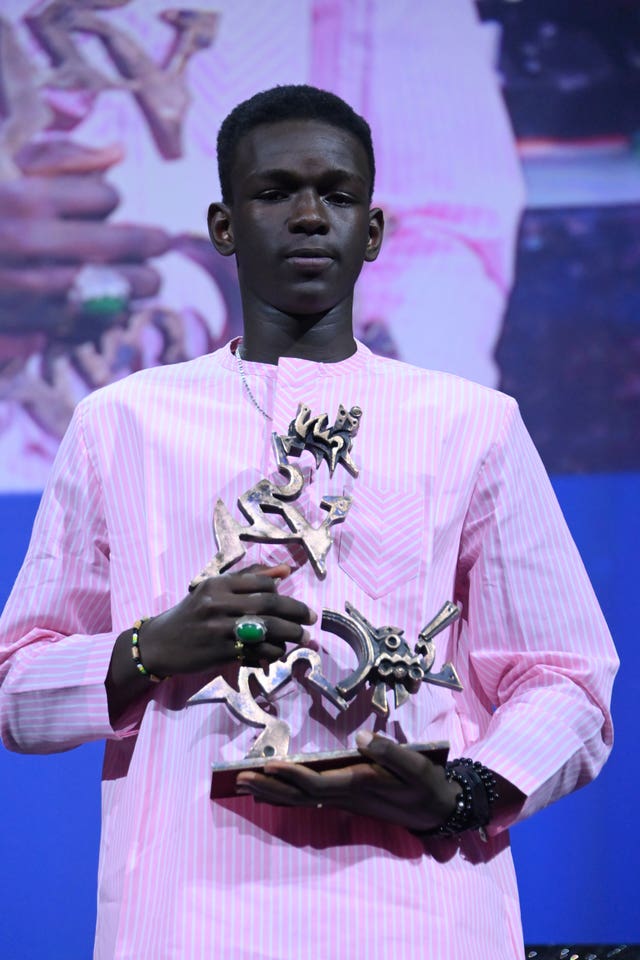 Actor Seydou Sarr poses with the Marcello Mastroianni award for best new young actor, which he received for his performance in Io Capitano, during the closing ceremony for the 80th edition of the Venice Film Festival in Italy