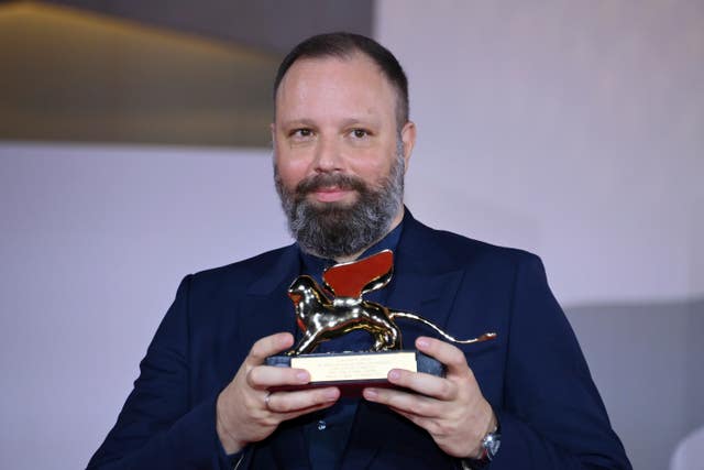Greek director Yorgos Lanthimos with the Golden Lion award for the best film Poor Things after the closing ceremony for the 80th edition of the Venice Film Festival in Italy 