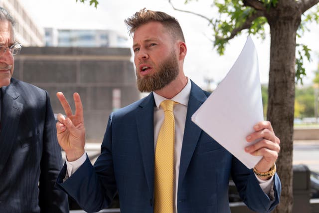 Infowars host Owen Shroyer outside the E Barrett Prettyman US Federal Courthouse in Washington