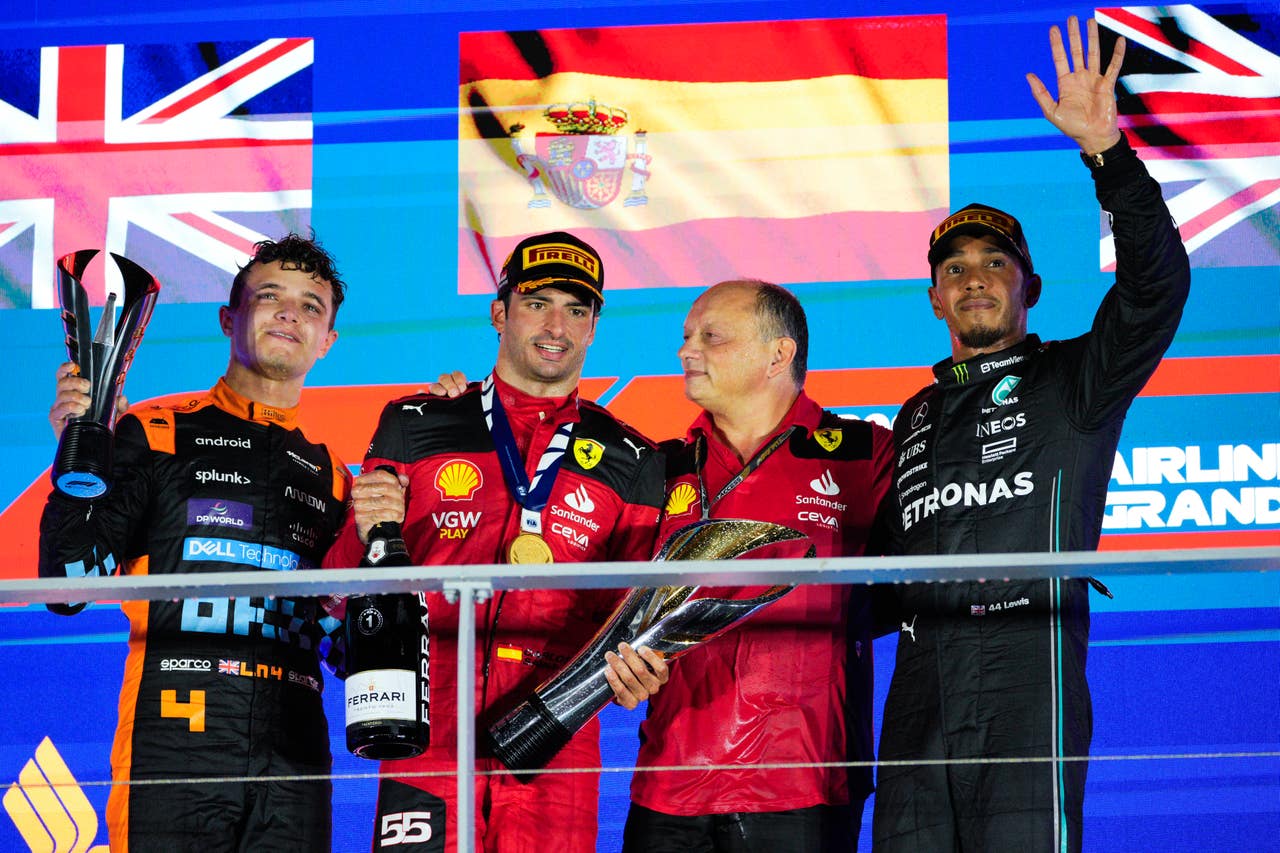 Carlos Sainz holds on for victory in Singapore as Red Bull’s winning