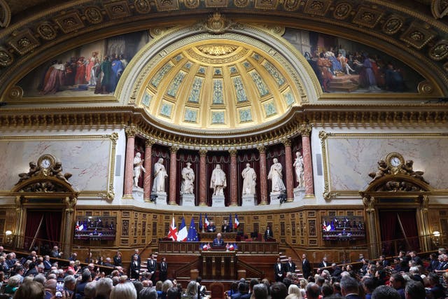 The King addresses both the upper and the lower house of parliament at the French Senate in Paris