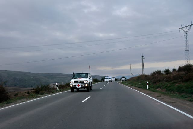 The motorcade with the first group of refugees