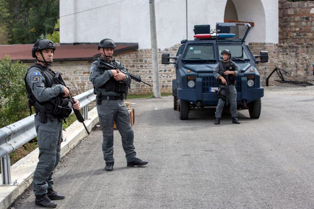 Kosovo police officers secure the area outside the Banjska monastery 