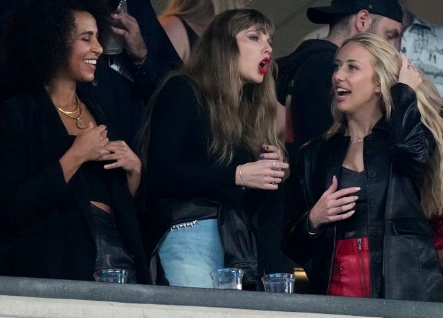 Taylor Swift, centre, and Brittany Mahomes, right, watch the New York Jets against the Kansas City Chiefs during an NFL game