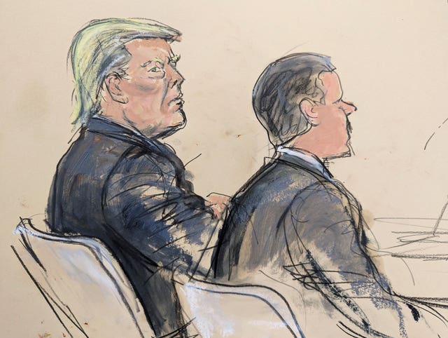Courtroom sketch shows former Donald Trump, left, seated at the defence table next to his lawyer Christopher Kise