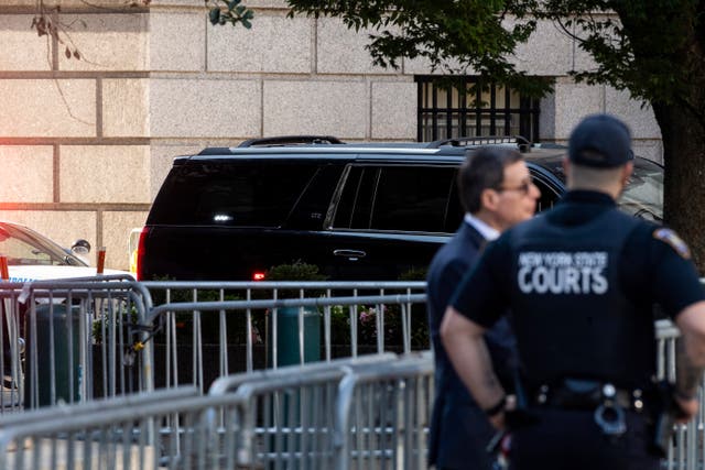 Former president Donald Trump’s motorcade arrives at the court