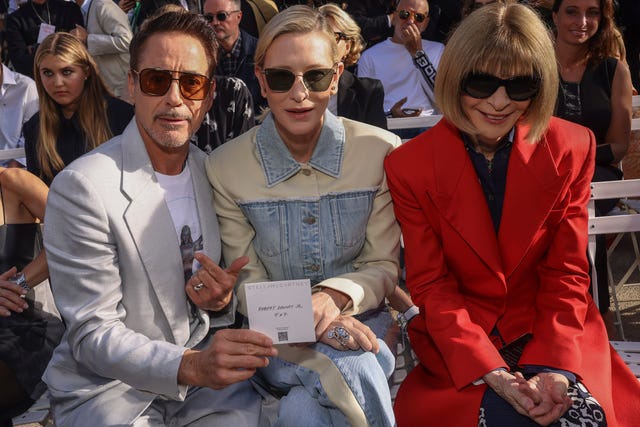 From left: Robert Downey Jr, Cate Blanchett and Anna Wintour attend the Stella McCartney Spring/Summer 2024 womenswear fashion collection