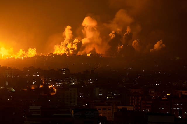 Fire and smoke rise following an Israeli airstrike in Gaza City 