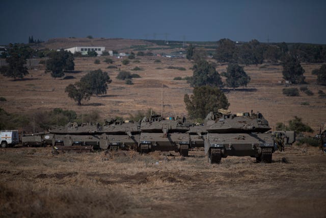 Israeli tanks seen near the border with Lebanon on Tuesday 