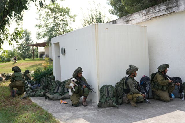 Israeli soldiers deploy in Kfar Azza 