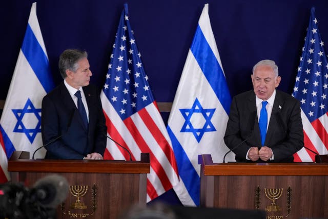 Antony Blinken listens to Benjamin Netanyahu